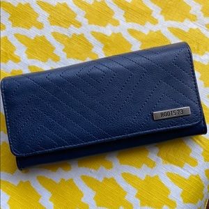 Blue never used roots wallet